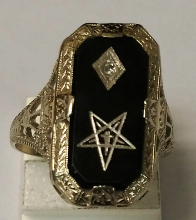 a large black ring with a star on it