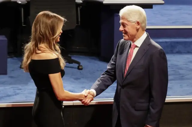 Melania Trump and Bill Clinton