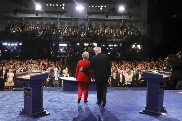 Hillary Clinton and Donald Trump embrace