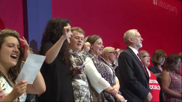 Jeremy Corbyn joins Labour members singing the Red Flag