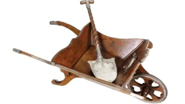 Wheelbarrow and spade