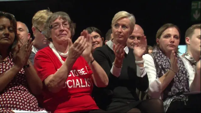 Delegates applauding