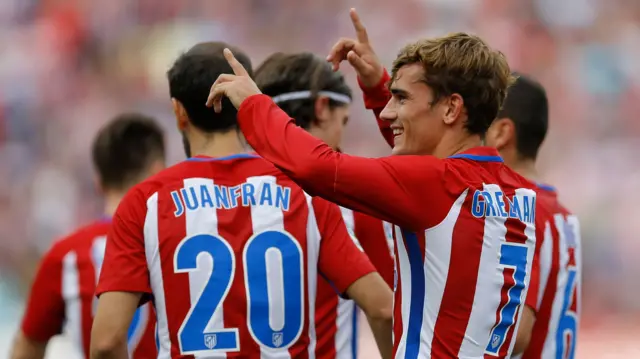 Atletico's Antoine Griezmann (right)