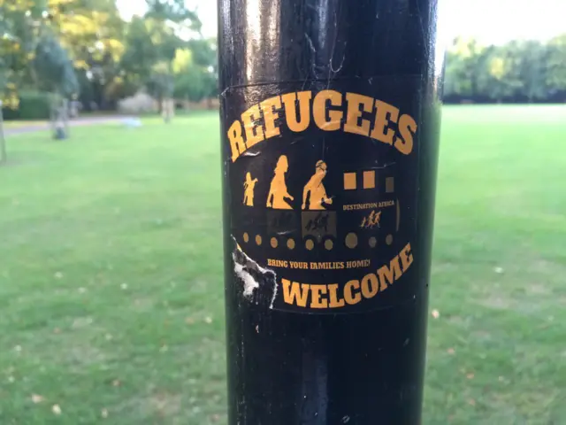 Sticker reading "refugees not welcome"