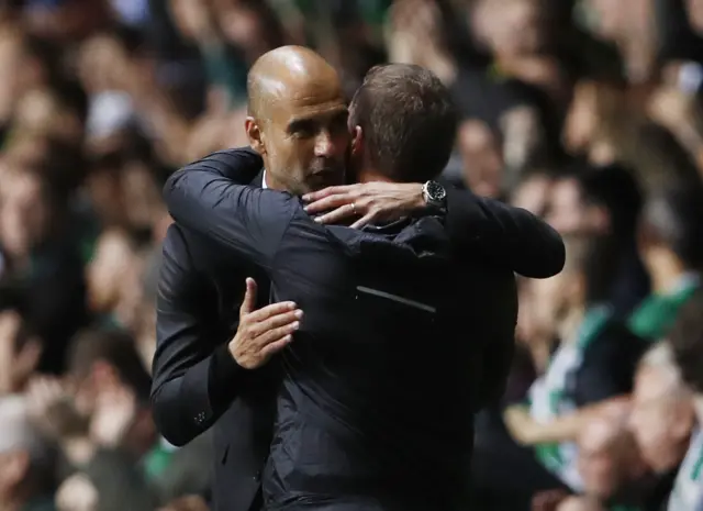 Guardiola and Rodgers hug after the game