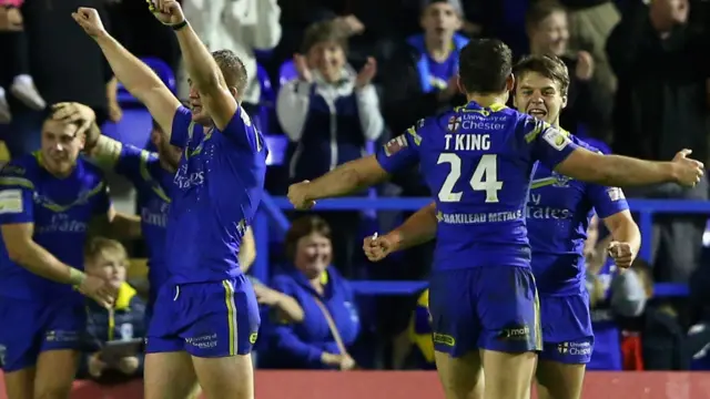 Warrington Wolves celebrate beating St Helens