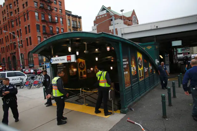 Emergency workers gather outside New Jersey Transit"s rail station in Hoboken, New Jersey.