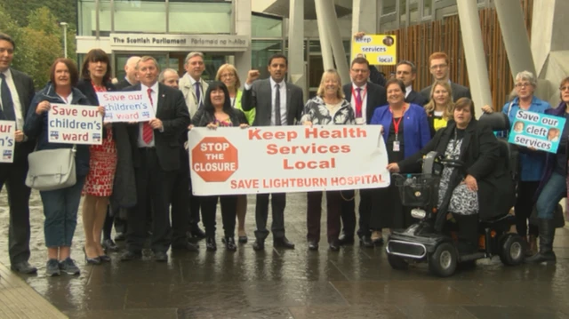 A rally of MSPs and local health campaigners was held outside parliament