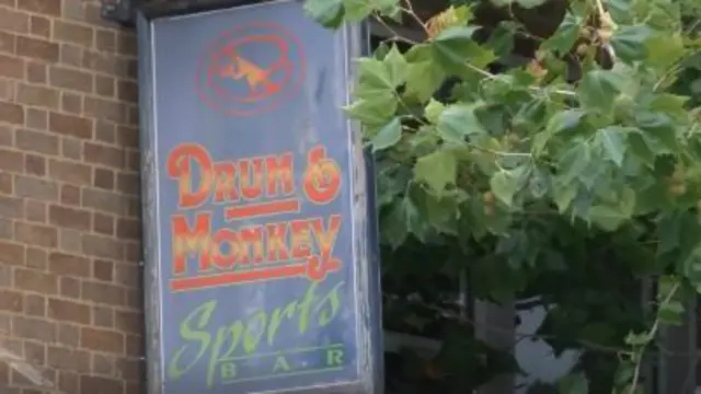 Drum and Monkey sign