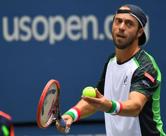 Paolo Lorenzi serves