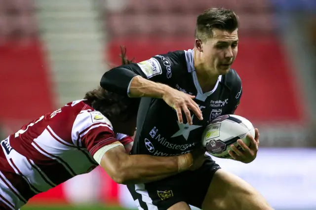 Jamie Shaul tackled