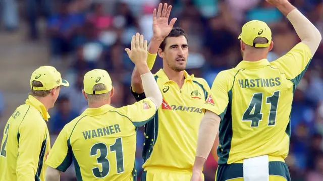 MItchell Starc celebrates a wicket