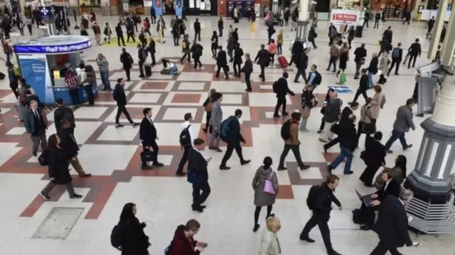 Commuters at a train station