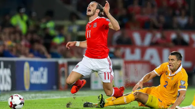 Bale is fouled by Igor Armas of Moldova