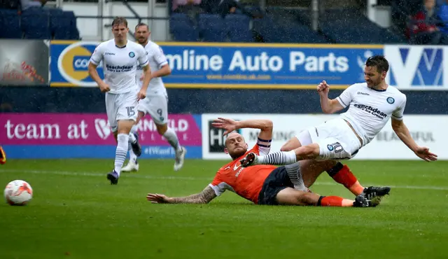 Matt Bloomfield scores Wycombe's only goal