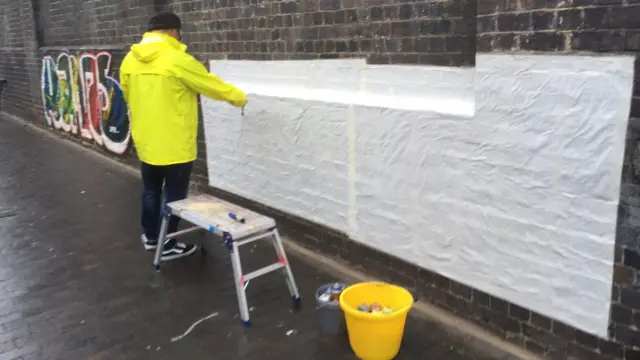 Graffiti artist in Birmingham as part of the film Ready Player One