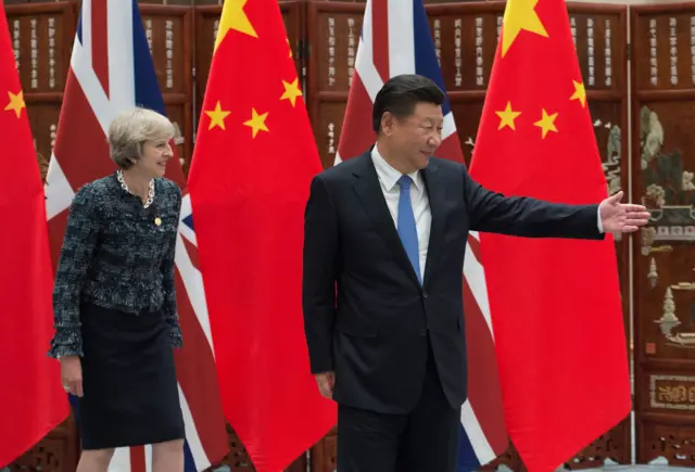 Theresa May and China President Xi Jinping