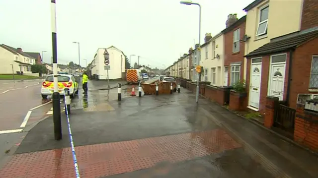 Police at Carter Road in Wolverhampton where a man was found stabbed