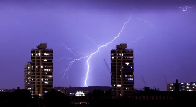 Lightning flashes in the night sky over South London