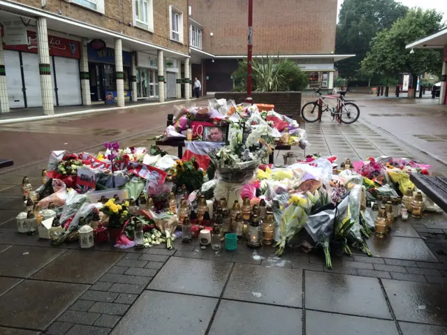 Floral tributes to Arek Jozwik at The Stow, Harlow