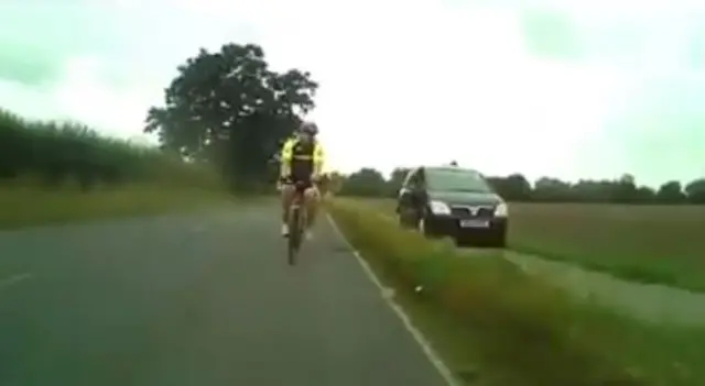 Cyclists being undertaken by car on cyclepath