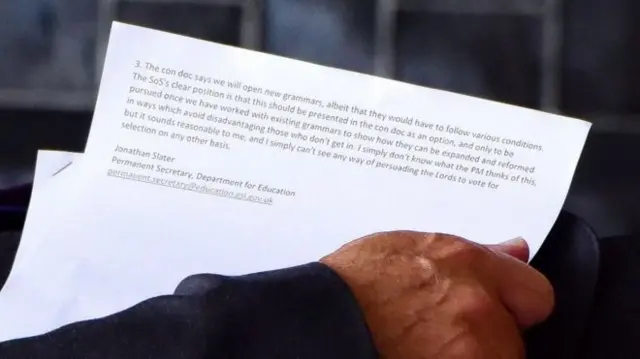 Up close shot of briefing paper carried into Downing Street