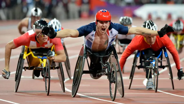 David Weir celebrates winning one of his four gold medals for ParalympicsGB at London four years ago