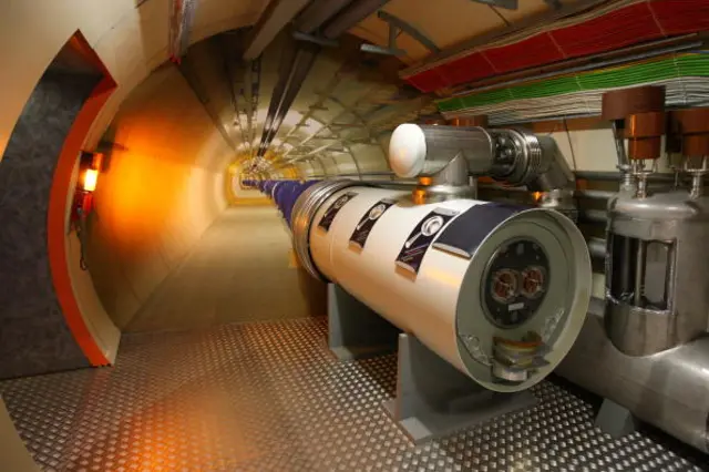 A model of the Large Hadron Collider (LHC) tunnel is seen in the CERN