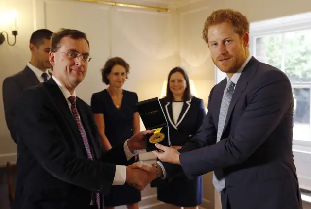 Prince Harry gives Papworth team Elizabeth Marks' Invictus medal