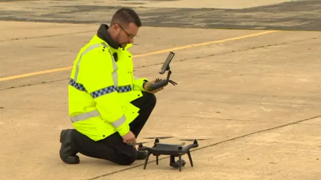 Police officer with a drone