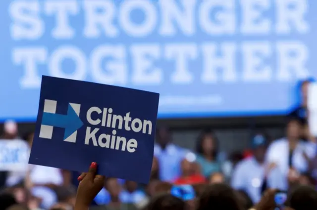 A Clinton supporter waves a campaign sign in Philadelphia last month