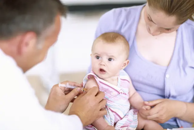 Baby being vaccinated