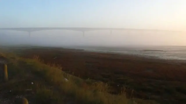 Orwell Bridge and estuary in early morning mist