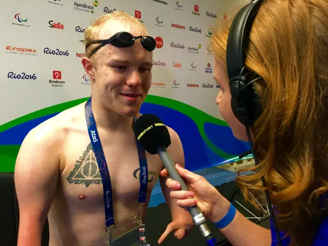 Andrew Mullen is interviewed by the BBC after the race