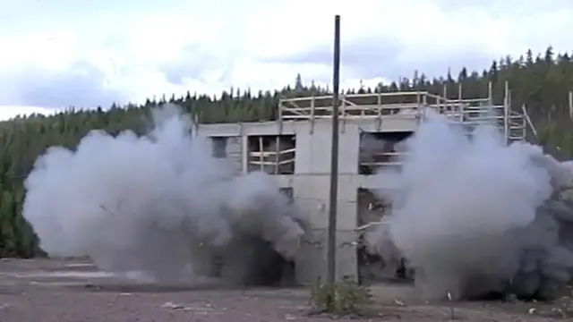 A building blown up to test the device