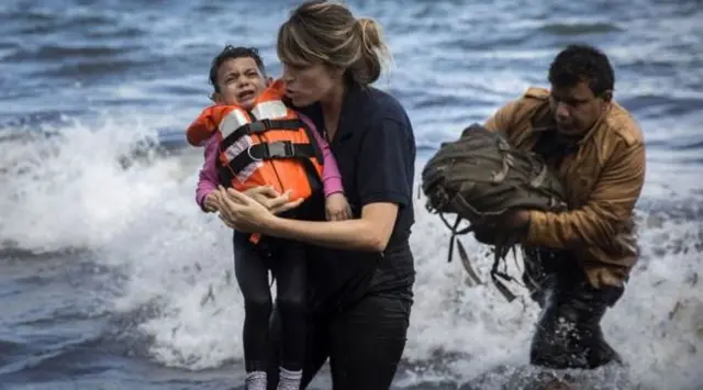 syrian child rescued from a dinghy