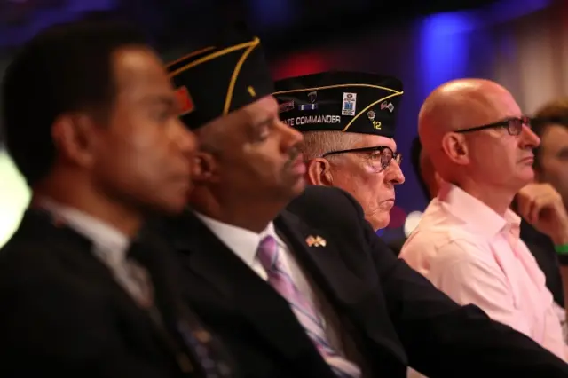 Veterans watch the event