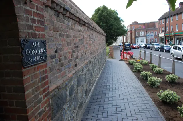 Re-built brick wall