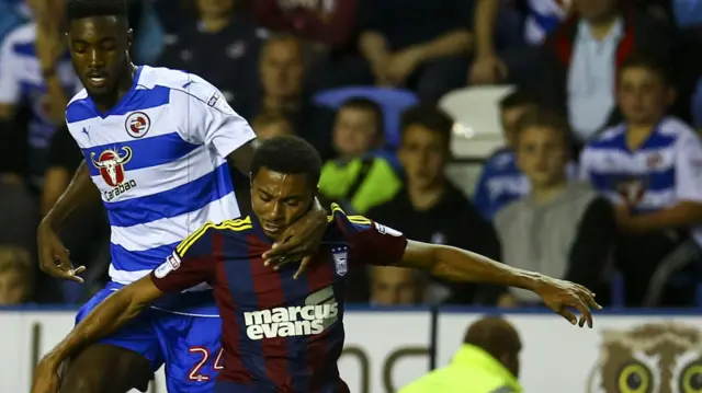 Grant Ward of Ipswich Town (right) under pressure from Tyler Blackett of Reading