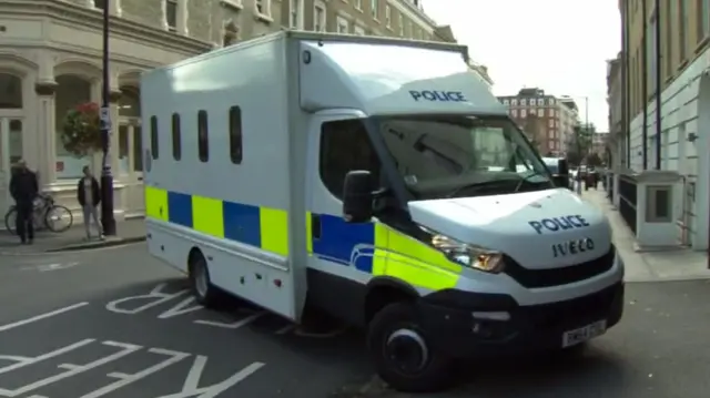 Police convoy arrives at Westminster Magistrates Court
