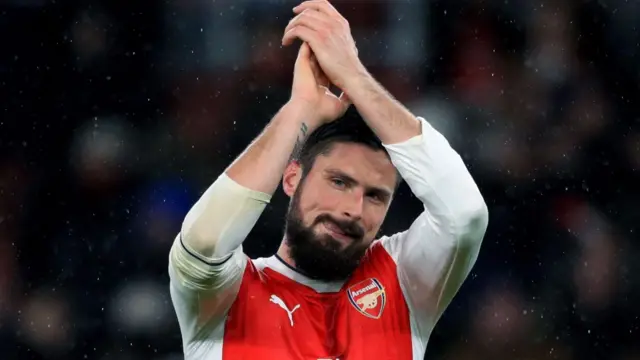 Olivier Giroud applauds fans