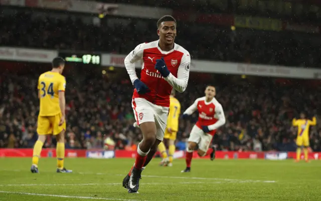 Alex Iwobi celebrates scoring