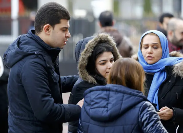 Relatives of victims from the Reina nightclub, which was attacked by a gunman, wait outside the forensic medicine institute in Istanbul, Turkey, January 1, 2017.
