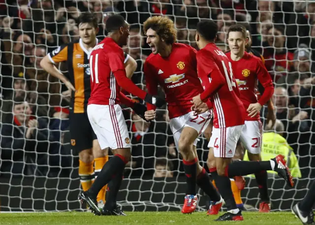 Marouane Fellaini celebrates scoring