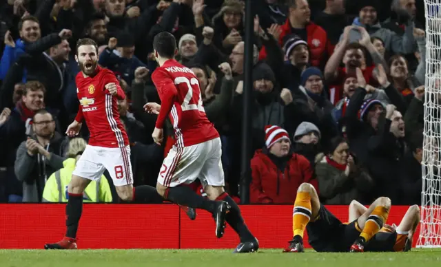 Juan Mata celebrates