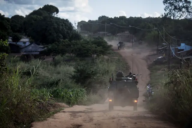 Mozambican regular army vehicles patrolling