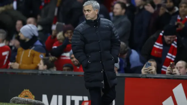 Jose Mourinho walks off