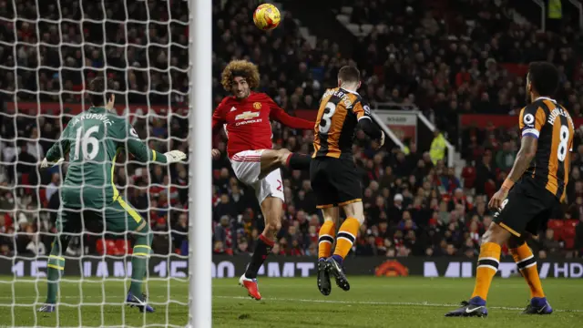 Marouane Fellaini scores