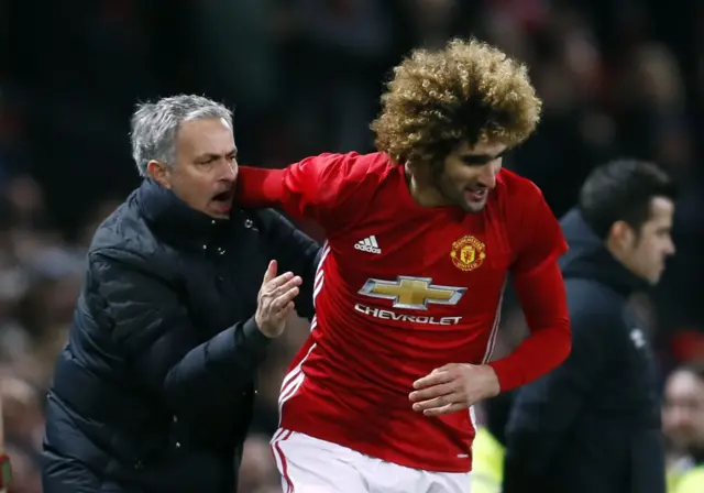 Marouane Fellaini celebrates