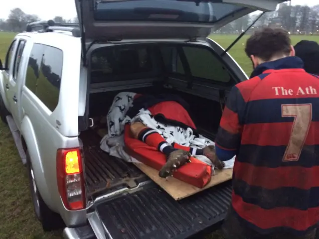 Rugby player in truck